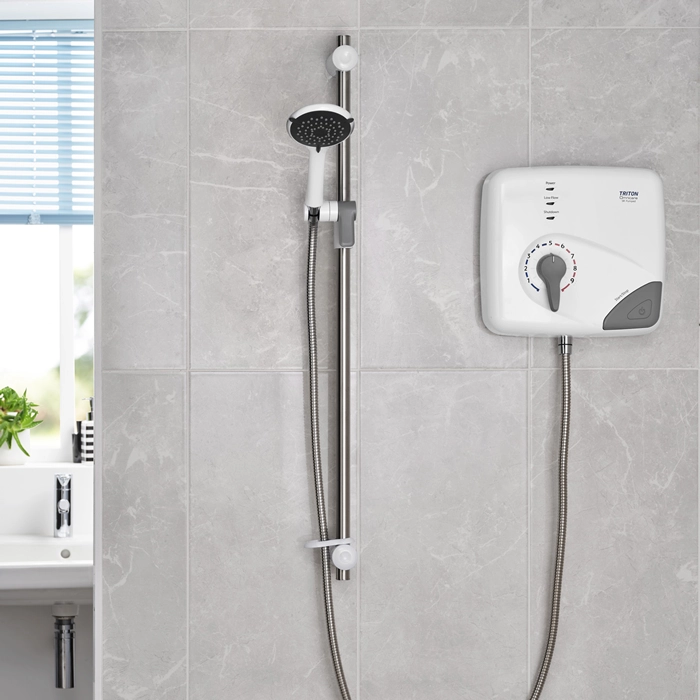 Triton Showers Omnicare Pumped White with grey tiles